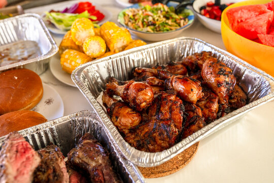 summer bbq grilled chicken watermelon platter of food at gathering