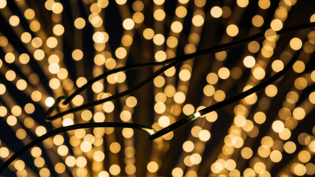 Abstract Golden Bokeh Lights Background with Soft Glow