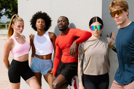 Portrait of a group of athletes looking directly at the camera