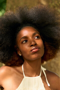 Portrait of a Person Outdoors With Natural Hair at Daytime