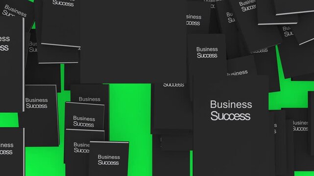 Top down view of business success books falling and piling up