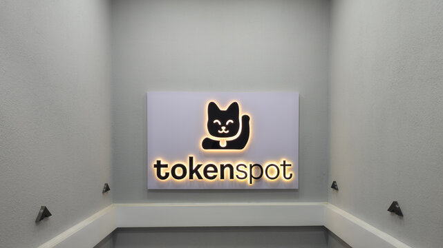 Tokenspot illuminated sign