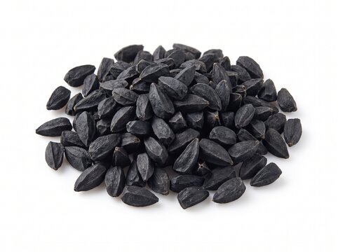 Pile of organic black sunflower seeds isolated on a white background, high quality raw natural snack ingredient full of healthy vitamins and minerals