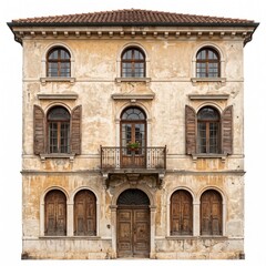 Fototapeta premium Historic Italianate building facade with arched windows and wooden shutters in soft sunlight