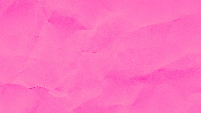 Crumpled pink paper texture background for creative design projects