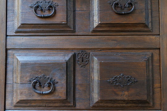 Wooden cabinet doors with vintage metal handles