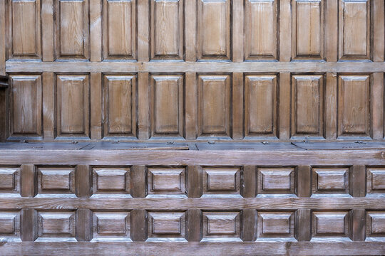 Wooden wall with decorative paneling in a historic building