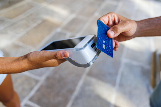 Contactless payment process using a card at a point of sale terminal