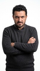 Obraz premium Man with furrowed brow and crossed arms expresses anger and frustration, white background