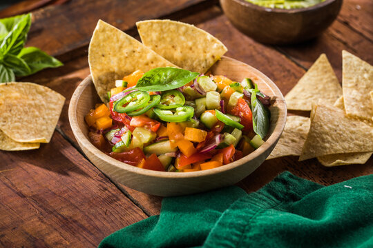 A delicious home made salsa pico de gallo with tomato red onion lime cilantro and jalapeno pepper.