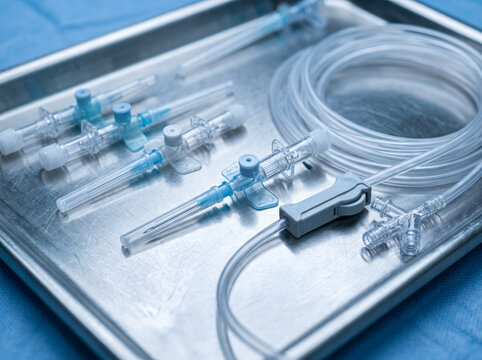 Sterile Intravenous Cannula and Tubing Set on Medical Metal Tray