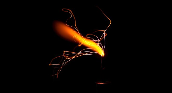 Dynamic Glowing Fire Element with Energetic Sparks Against Dark Background