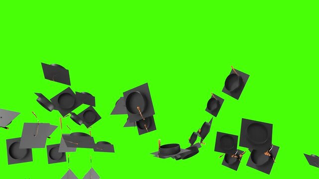 Many graduation caps being thrown into the air for celebration