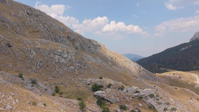 Aerial View of Rocky Slope and Sunburnt Dry Grass on Visocica Mountain Bosnia