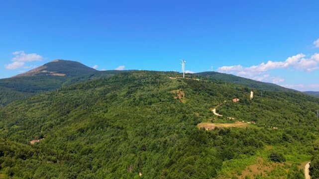 Aerial Wide View of Wind Turbines on Mountain Ridge Near Ivan Sedlo Pass Bosnia