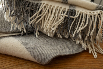 Soft woolen plaid texture with herringbone and plaid pattern in neutral beige and grey tones © Oleg