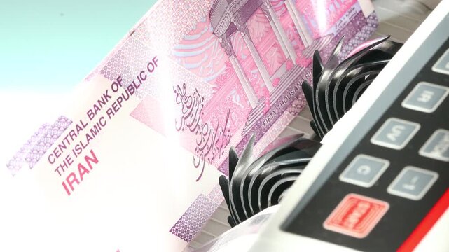 Iranian money. Economic and trade concept. A counter adds one banknote at a time. Symbol of the printing of increasingly higher rial currency values. Business and financial background. Close up