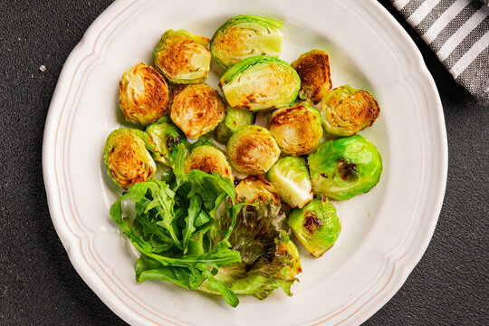 Brussels sprouts dish vegetable dish tasty snack fresh and delicious gourmet food background on the table  rustic food top view copy space keto and paleo diets vegetarian and vegan food