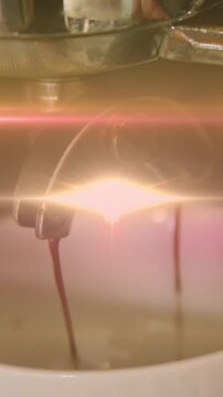 Animation of light spots over coffee machine