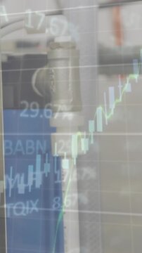 Animation of financial data processing and statistics over machinery in factory