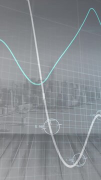 Animation of glowing graphs moving against aerial view of cityscape