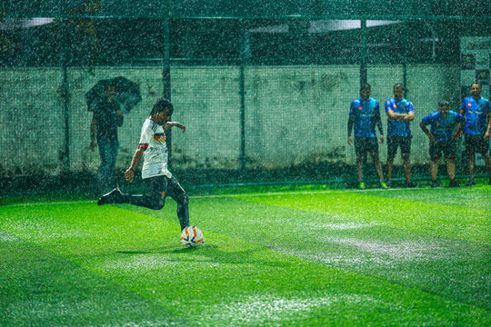 man playing in Rain