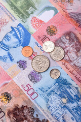 Brunei paper money, dollar banknotes and sen coins as currency for exchange or travel. Brunei money © chernikovatv