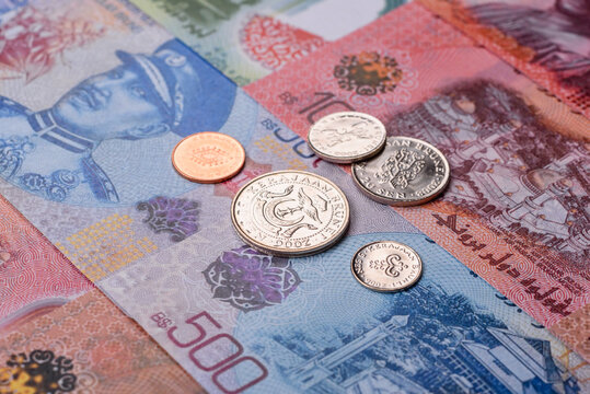 Brunei paper money, dollar banknotes and sen coins as currency for exchange or travel. Brunei money