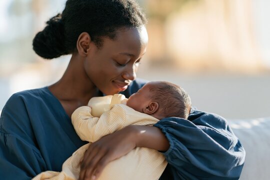 Smiling mother feeding newborn with bottle at home for parenting brochure background and family care layout