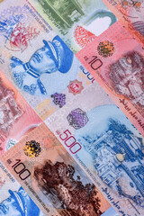 Brunei paper money, dollar banknotes and sen coins as currency for exchange or travel. Brunei money © chernikovatv