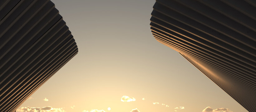 Low angle view of two parametric architectural structures framing a golden sunset sky