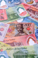 Brunei paper money, dollar banknotes and sen coins as currency for exchange or travel. Brunei money © chernikovatv