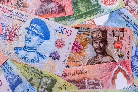 Brunei paper money, dollar banknotes and sen coins as currency for exchange or travel. Brunei money
