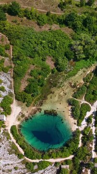 Aerial view of the Cetina River source, known as the Eye of the Earth, a karst spring in Croatia