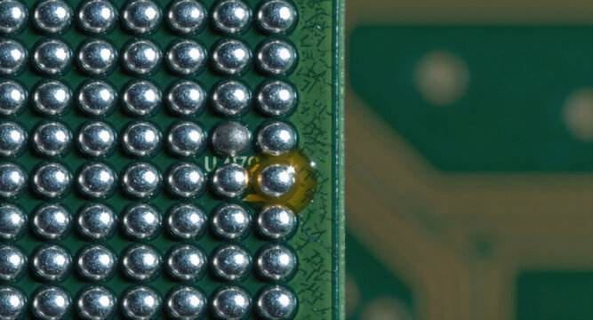 BGA Solder Balls on AI Accelerator PCB Macro - Semiconductor AI Hardware Detail - Chip Design Background - Diffused Inspection Light