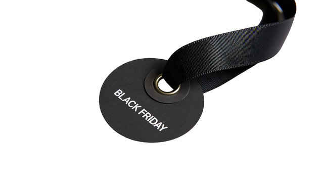 Isolated elegant black circular Black Friday sale tag with a ribbon, marketing discount symbol.
