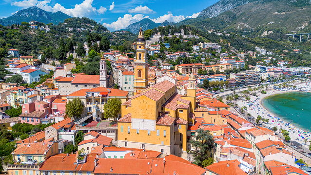 Aerial drone view of the Basilica of Saint-Michel in the old town of Menton on the coast of the Mediterranean Sea in the French Riviera