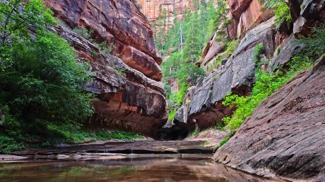 Scenic view captures the iconic tunnel entrance of the Subway formation in Zion National Park