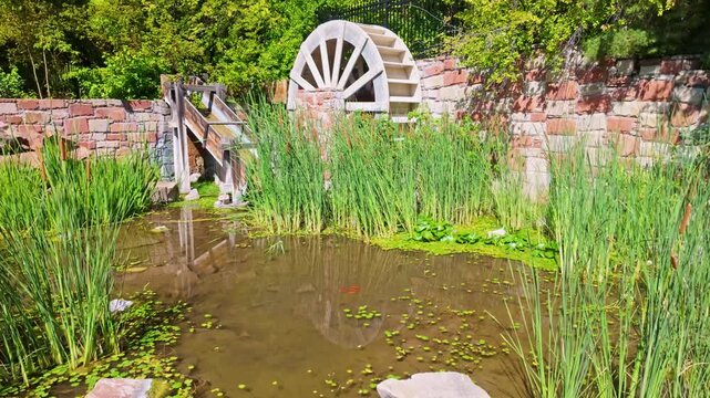 Historic water mill stands scenically preserved at Brigham Young Historic Park