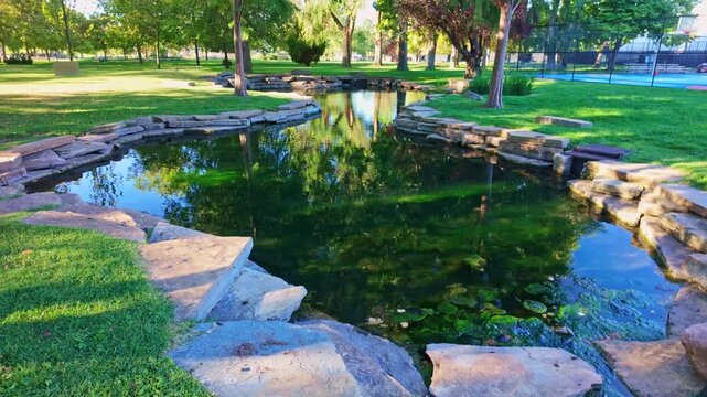 Hidden Koi Pond sits peacefully tucked within Liberty Park in Salt Lake City