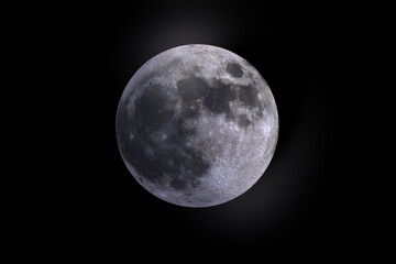 Detailed full moon isolated against a pure black background, revealing prominent lunar craters and surface details. © Morad