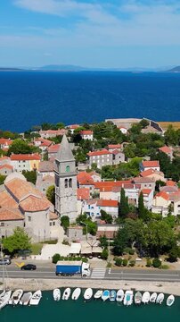 Osor City Panorama On Cres Island, Croatia,  Beautiful Summer Day. Aerial Views Show The Historic Old Town, Sunny Beaches, Sailing Yachts, Marina Harbor, Nearby Campsites Mediterranean Adriatic Coast
