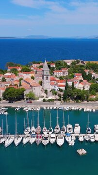 Osor City Panorama On Cres Island, Croatia,  Beautiful Summer Day. Aerial Views Show The Historic Old Town, Sunny Beaches, Sailing Yachts, Marina Harbor, Nearby Campsites Mediterranean Adriatic Coast