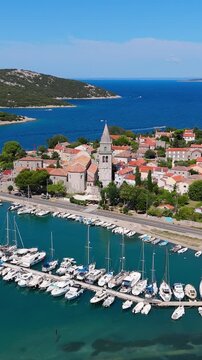 Osor City Panorama On Cres Island, Croatia,  Beautiful Summer Day. Aerial Views Show The Historic Old Town, Sunny Beaches, Sailing Yachts, Marina Harbor, Nearby Campsites Mediterranean Adriatic Coast