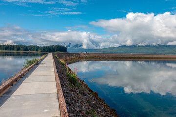 Fototapeta premium Footpath surrounding Hoonah Harbor leading to Grave Point, Pitt Island, Hoonah, Alaska, USA