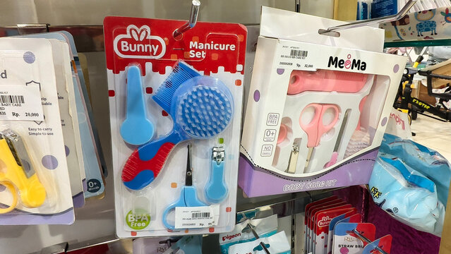 Infant Grooming and Manicure Care Tool Kits for Newborn Hygiene Displayed on Retail Store Shelves