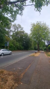 August 18th, 2026. Urban City Streets View of Luton Town of England Great Britain During Mostly Cloudy Day. Wide Angle Handheld Camera Footage Was Captured During Day Walk. 