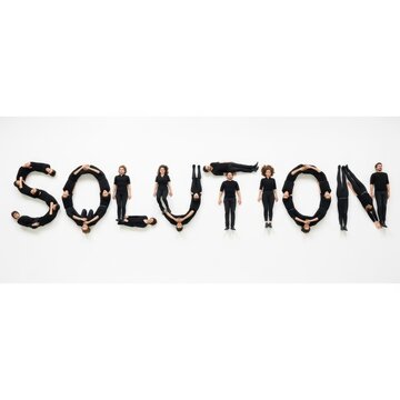 Creative Solution Word Made From Small Human Figures.