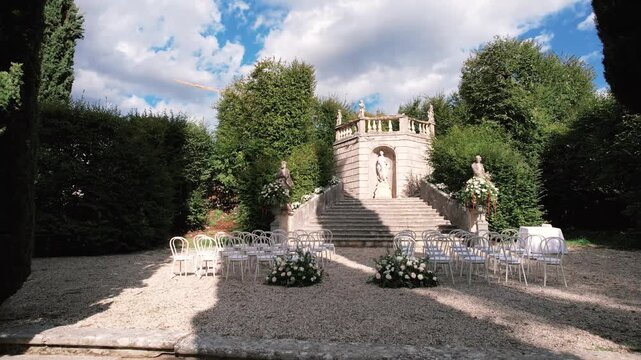 Love celebration scene. Romantic wedding setting decorated with beautiful floral arrangements carefully arranged