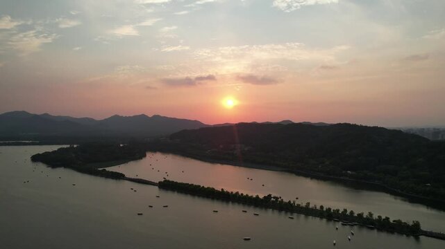 Wide sunset panorama over West Lake in Hangzhou China